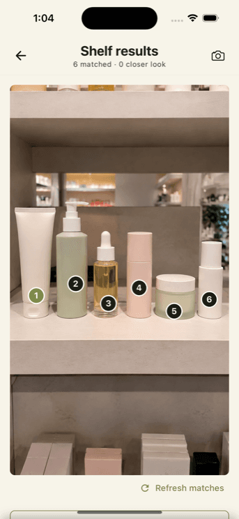 A shelf of skincare products photographed in Skincareful, each numbered with a match result